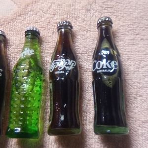 Mini coke and sprite bottles w/soda inside